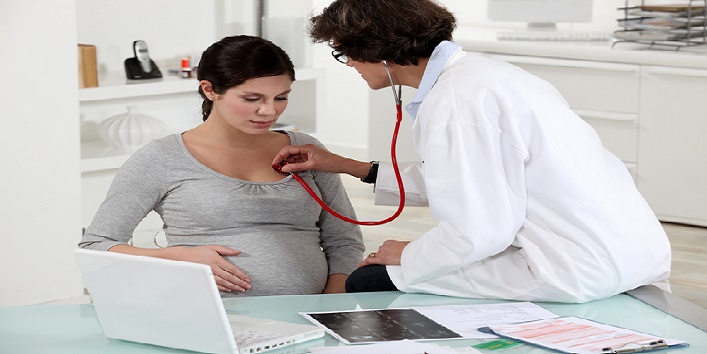 pregnant woman and doctor
