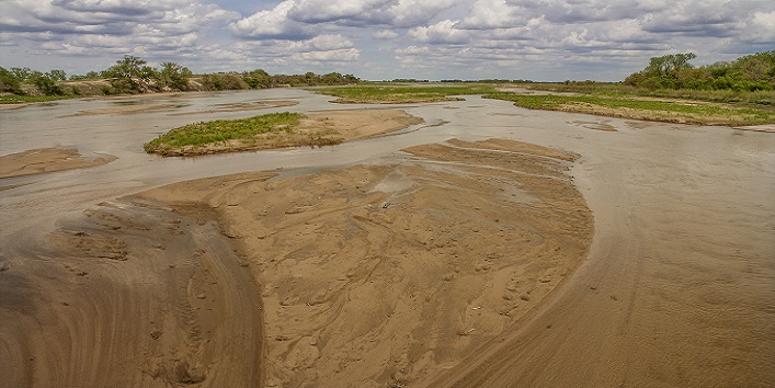 A river where sand flows with water
