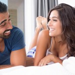 Happy-couple-in-bedroom-romance-mood