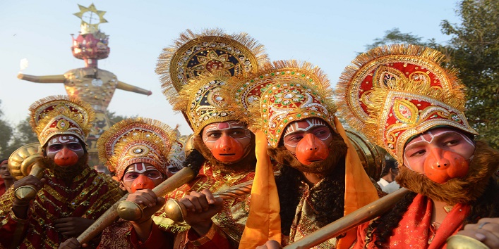 Indian Hindus dressed as deities Lord Hanuman pose during a religious procession on the grounds of Durgiana temple in Amritsar on the occasion of the Hindu festival of Dussehra. Held at the end of the Navratri (nine nights) Festival, Dussehra symbolizes the victory of good over evil in Hindu mythology. On the night of Dussehra, fire-crackers and stuffed effigies of Ravana are set alight in open grounds across the country. (Narinder Nanu/Getty Images)