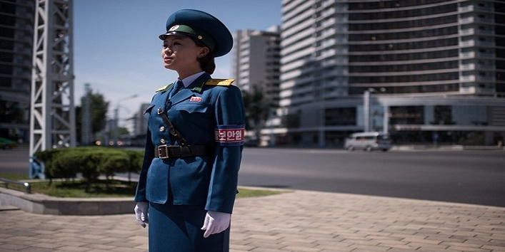 Traffic ladies are hired for their looks in north korea cover