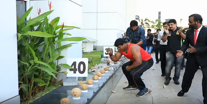 This man broke 122 coconuts in a minute cover