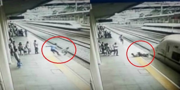 आत्महत्या के लिए ट्रेन के आगे कूदी महिला, आपके रौंगटे खड़े कर देगा यह वीडियो